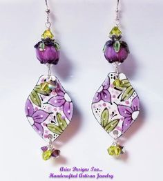 Handpainted Bohemian Floral Charm Earrings in Amethyst and Olive Green Artistic Hand-painted Purple Earrings, Bohemian Hand Painted Dangle Flower Earrings, Bohemian Hand Painted Purple Earrings, Purple Hand Painted Bohemian Earrings, Unique Hand Painted Purple Earrings, Artistic Hand Painted Purple Jewelry, Cloisonne Jewelry, Bali Silver, Bohemian Floral