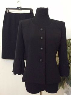 M2/10M/22522). Beautiful Multi-occasion and Corporate Le Suit women’s black 100% polyester 2 piece skirt suit size 6P EUC! Features long sleeves collarless jacket with bell sleeves, front button closure. Black sateen lining with shoulder pads for perfect fit. Skirt has back zipper and hook closure. Black inner lining for comfort. Back bottom vent openings. Note: all measurements are +/- 2 inches. Please see and enlarge pictures for details. Excellent preowned condition. Please review measurement 2 Piece Skirt, Fit Skirt, Collarless Jacket, Le Suit, Suit Women, Skirt Suit, Women Clothes, Shoulder Pads, Suits For Women