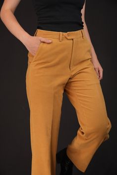 A luxurious pair of tailored trousers made from moleskin fabric in a light mustard yellow tone. Moleskin is similar in suede in terms of the feel, but is made from pure cotton. It is also similar to velvet while being more resistant. The trousers are by 'Basile blu' and have been made in Italy in the 1990s. They are in perfect condition, without any noticeable signs of wear. Indicated is size 48 (male S-M), drop 6. However they are also suitable for women. I am 175cm (5.9ft) tall and usually wea Mustard Fitted Bottoms For Workwear, Fitted Mustard Bottoms For Workwear, Formal Yellow Trousers, Mens Tailor, Yellow Tones, Extra Fabric, Tailored Trousers, Mustard Yellow, Moleskine