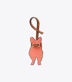 a key chain with a dog on it and a leash attached to the end of it