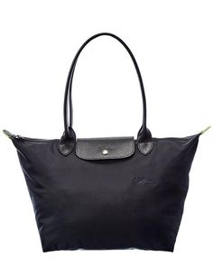 Women's Longchamp Le Pliage Green Nylon Bag - Black - Totes About the brand: Understated luxury leather goods with a French elegance. Made in Italy. Le Pliage Green Nylon Bag in black nylon with foldable design. Measures 10.43in wide x 11.02in high x 6.1in deep. Zipper closure. Please note: All measurements were taken by hand and are approximate; slight variations may occur. Our products are 100% genuine. In some cases we purchase merchandise from trusted independent suppliers and not directly f Luxury Packable Bags For On-the-go, Modern Travel Shoulder Bag Packable, Modern Packable Shoulder Bag For Travel, Versatile Black Foldable Shoulder Bag, Modern Foldable Bag For Everyday, Black Foldable Shoulder Bag For Travel, Travel Foldable Tote Shoulder Bag, Foldable Tote Shoulder Bag For Travel, Versatile Foldable Shoulder Bag For On-the-go