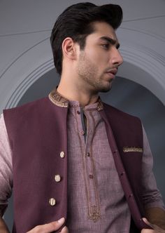 Waist Coat : Embroidered waistcoat in a deep maroon hue to layer over black shalwar kameez, for a perfect festive look. Details : Straight Front with Embellished band Plain Back, Band Neckline. Color : Maroon. Fabric : Melange winter fabric. Country of Origin : PakistanCare Instruction : Should be washed in gentle cycle and hung to dry. Color may bleed so please be mindful of other items with it.Disclaimer : Actual sizes might be slightly different from the size chart. Traditional Nehru Jacket For Diwali Semi-formal, Traditional Nehru Jacket For Diwali Semi-formal Occasion, Traditional Semi-formal Nehru Jacket For Diwali, Embroidered Nehru Jacket For Diwali Semi-formal Occasions, Unstitched Nehru Jacket For Semi-formal Festivals, Semi-formal Traditional Nehru Jacket For Eid, Semi-formal Nehru Jacket With Resham Embroidery For Diwali, Semi-formal Traditional Wear With Resham Embroidery, Traditional Semi-formal Winter Sets