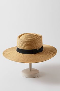 Trust this styled gaucho to keep the season cool. Paper braid shades you with UPF 50 sun protection, beautiful texture, and a 4" brim. And it's finished with a grosgrain ribbon and bow, and an inner drawstring that gives you a comfort fit. 80% Paper Braid, 20% Polyester. Western Hat Styles, Gaucho Hat, Panama Hat Style, Fedora Hat Style, Cossack Hat, Cowboy Hat Styles, Straw Cloche Hat, Bucket Hat Style, Outback Hat