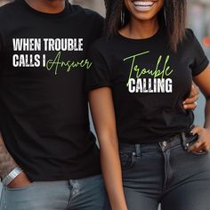 Get ready to turn heads with our Matching Couple Tees, designed for couples who love to coordinate their outfits and show off their style. Whether you're heading to a concert, on your honeymoon, or just having a fun day out, these shirts are perfect for any occasion! THIS LISTING IS FOR 2 MATCHING COUPLES SHIRTS. Shirt 1: When Trouble Calls I answer Shirt 2: Trouble Calling Perfect for Halloween Couples Matching shirts for boyfriend shirt and girlfriend shirt. Funny Couples Shirts Add a touch of Black Cotton Couples T-shirt, Black Cotton T-shirt For Couples, Couples Cotton Tops With Letter Print, Dad Outfits, Funny Couple Shirts, Girlfriend Shirts, Couple Tees, Honeymoon Shirts, Matching Mom