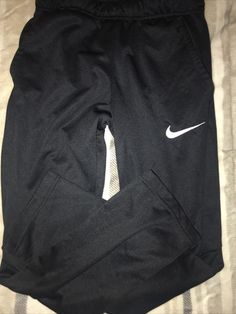 NIKE DRI-FIT Jogging Pants YOUTH LARGE Black W/Pockets White SWOOSH. Condition is "Pre-owned". Shipped with USPS Priority Mail. Casual Training Pants With Pockets, Casual Sweatpants With Side Pockets For Training, Nike Casual Joggers For Training, Nike Sporty Activewear With Side Pockets, Nike Activewear With Pockets For Sports, Casual Nike Joggers For Training, Sporty Sweatpants With Pockets For Training, Nike Activewear With Pockets For Training, Sportswear Joggers With Pockets For Sports Season