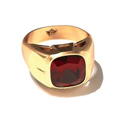 Part of the Resort Collection, the Grand Touring Ring is a statement of refined adventure and sophistication. Cast in solid gold and crowned with a deep red garnet, this signet ring captures the essence of timeless luxury. The rich hue of the garnet evokes the allure of far-flung destinations and the warmth of sunset-lit landscapes. Designed for the discerning traveler who seeks both elegance and character, this ring pairs classic signet styling with a modern flair. The Grand Touring Ring is mor Luxury Ruby Signet Ring For Formal Occasions, Luxury Polished Finish Ruby Ring For Formal Occasions, Formal Ruby Signet Ring, Formal Red Birthstone Ring With Polished Finish, Heirloom Red Signet Ring With Polished Finish, Formal Red Polished Birthstone Ring, Luxury Yellow Gold Rings With Garnet, Formal Ruby Signet Ring In Fine Jewelry Style, Ruby Signet Ring Fine Jewelry For Formal Events