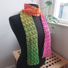 Made with Hobbii Twister in the colour Cactus Flower. It's 55% cotton and 45% acrylic. Hand washing is recommended. These skinny scarves are super cute. They won't keep you warm but will add a splash of colour to your outfit. Spring Green Cotton Scarves, Green Cotton Scarves For Spring, Casual Green Cotton Scarves, Casual Multicolor Cotton Scarves, Casual Multicolor Cotton Scarf, Casual Multicolor Crochet Scarves, Casual Green Handmade Scarf, Crochet Infinity Scarf, Triangle Shawls