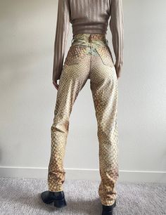 "Extremely Rare 90s Roberto Cavalli pineapple print jeans. Flattering shape, high waist, straight leg. Size small Waist 25\" hips 35\" inseam 30\" rise 11\" Very good vintage condition. For the reference: model 5'8\", size xs 30\"A/25\"/35\" *all items will be washed/cleaned before shipping. *some items may come with minor flaws due to vintage pre-loved condition. All major flaws will be described and photographed. *tag us on Instagram (@alizee_vintage) wearing your special garments from Alizee Y2k High Rise Fitted Pants, Y2k Fitted Full-length Jeans, Fitted High Rise Y2k Pants, Y2k Style Fitted Full Length Jeans, Y2k Full Length Fitted Jeans, 90s High Waist Pants With Five Pockets, Y2k Fitted Straight Leg Pants, 90s Style Stretch Straight Leg Bottoms, Y2k High-waisted Fitted Jeans