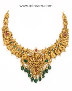 22 Karat Gold "Lakshmi - Peacock" Necklace with Cz, Color Stones, Beads & Pearls (Temple Jewellery)

Enhance Your Beauty with 22 Karat Gold "Lakshmi - Peacock" Necklace!    Indulge in the exquisite craftsmanship of Indian gold jewelry with this stunning 22 Karat Gold "Lakshmi - Peacock" Necklace from Totaram Jewelers. Adorned with sparkling CZ stones, colorful beads, and lustrous pearls, this temple jewelry piece is a true masterpiece that will elevate your style to new heights Luxury Chandbali Necklace For Anniversary, Luxury Traditional Temple Necklace With Stone Work, Luxury Kundan Temple Necklace With Meenakari, Luxury Temple Jewelry Pearl Necklace For Diwali, Luxury Jeweled Temple Jewelry Necklaces, Luxury Bollywood Kundan Temple Necklace, Luxury Gold Kundan Necklace With Diamonds, Luxury Gold Temple Necklace For Festive Occasion, Luxury Traditional Beaded Temple Necklace