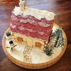 a cake made to look like a log cabin