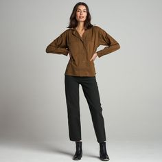 The Fay Utility Camp Shirt is roomy and relaxed but decidedly feminine and sophisticated. Crafted from cotton lawn, a lightweight yet durable fine thread poplin, the Faye has a silky-smooth hand feel. Its unique features include a lay-flat camp collar with an elevated top button and loop closure, wide-set center front placket, and exquisite topstitching details on the sleeve placket and cuff. 100% Cotton Button flap patch pockets at the chest High side-slits at the hem for a fashionable tuck But Versatile Fall Blouse With Roll-up Sleeves, Versatile Everyday Shirt For Fall, Spread Collar Tops For Fall Daywear, Fall Daywear Tops With Spread Collar, Versatile Everyday Fall Shirt, Spread Collar Shirt For Daywear In Fall, Fall Daywear Shirt With Spread Collar, Classic Fall Blouse For Casual Gatherings, Effortless Fall Daywear Shirt