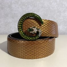 Authentic Gucci Tom Ford Snakeskin Metallic Serpent Snake Belt Rare 85/34 Hard To Find Belt In Excellent Condition Gold/Brown Metallic Embossed Snakeskin Finish Serpent Head Buckle With Rhinestones (Completely Removable) 1.5” Width Size 34” (Adjusts From 32.5 To 34.5” Using 3 Adjustment Holes) Unisex Snake Belt, Tom Ford Gucci, Serpent Snake, Crystal Belt, Snake Leather, Tom Ford Men, Gucci Gucci, Gucci Accessories, Metal Buckles