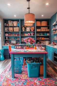 a room filled with lots of blue shelves and colorful rugs on top of it