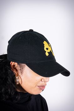 With unique designs you won't find anywhere else, our caps are the quality type that are designed with a thicker woven fabric. Not those flimsy weak ones that lose shape. 100% stitched embroidered design. Sport cap. Curved brim. Dry Clean Only. Comes in: adjust back. Perfect for those SOPHISTICATED ladies who needs head/face protection from the sun, sweat and elements while out doing fitness, events or anything fun. Adjustable Graphic Print Dad Hat, Adjustable Dad Hat With Graphic Print, Gold Casual Baseball Cap For Streetwear, Gold Baseball Cap For Streetwear, Black Baseball Cap With Graphic Print And Curved Bill, Adjustable Black Dad Hat, Cap Designs, Face Protection, Dad Cap