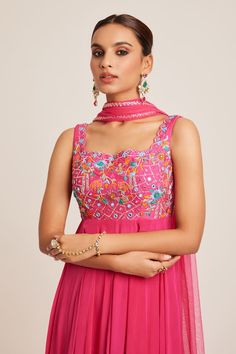 Fuchsia pink padded anarkali with attached can-can featuring multi-color thread, mirror and dabka hand embroidery on the yoke. Comes with a dupatta. - Aza Fashions Anarkali With Dupatta, Pink Thread, Can Can, Fuchsia Pink, Embroidery Thread, Anarkali, Aza Fashion, Hand Embroidered, Hand Embroidery