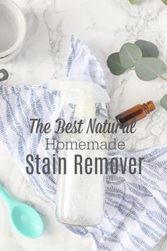 the best natural homemade stain remover for all skin types and colors, on a marble surface with eucalyptus leaves