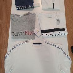 New All With Tags Calvin Klein Shirts Size: All Medium Original Prize $170 Calvin Klein White Shirt For Spring, Classic White Tops With Branding, Casual White Tops With Branding, Casual White Top With Branding, Classic Calvin Klein Crew Neck Top, Sporty Calvin Klein Tops For Spring, Classic Calvin Klein Tops For Spring, White Crew Neck Top By Calvin Klein, White Calvin Klein T-shirt For Spring