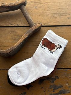 These Socks are just toooo cute!!  We love anything with a vintage lookin Hereford on it, and these socks do not disappoint!  Universal Adult + Kids size Both are separate listings I would say an adult size fits a ladies size 5-9 and Kids toddler/youth Retro White Cotton Socks, White Cotton Retro Socks, Retro White Socks For Winter, Western Aztec, Rodeo Cowgirl, Fort Pierce, Cowgirl Cowboy, Hereford, Ranch Style