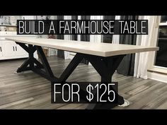 a white table with black legs and a sign that says build a farmhouse table for $ 126