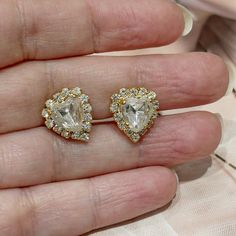 Clip-on earrings Material: gold metal Crystal: white Width: 1.30 cm (0.51") Height: 1.30 cm (0.51") All our objects are vintage and are made by Sphinx, a renowned English company which closed its doors at the beginning of the 2000s and if they seem new to you it is because they come from unsold stock and therefore never worn but nevertheless vintage. Founded in 1948, the Sphinx company was a British manufacturer, famous for its excellent quality costume jewelry. In addition to their own collecti Gold Heart Shaped Clip-on Earrings For Wedding, Gold Earrings For Valentine's Day Formal Occasion, Gold Earrings For Valentine's Day Formal, Formal Gold Earrings For Valentine's Day, Classic Gold Heart Earrings For Formal Occasions, Gold Heart-shaped Formal Earrings, Gold Heart-shaped Earrings For Formal Occasions, Heart-shaped Clip-on Jewelry For Formal Occasions, Formal Heart-shaped Clip-on Jewelry