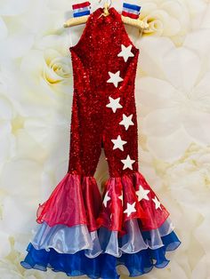 Gorgeous Red White Blue outfit - red sequins jumpsuit, romper with red, blue, white organza bell bottom and white stars applique.  Included 2 RWB wrist bands. Zipper back.  This outfit would be perfect for all important events such as Birthday, Party, Pageant, photo session.  Materials: sequins on velvet, organza, sequins. Colors and sizes. This outfit can be made in Red White Blue  colors in any size. Outfit is tailored to order in any standard size. The size chart is the picture of the listing Summer Fitted Pageant Dress With Ruffles, Fitted Summer Pageant Dress With Ruffles, Red White And Blue Outfits For Women, Western Wear Pageant Outfit, Patriotic Wear For Pageants, Valentines Pageant Outfit Of Choice, Red White And Blue Dance Costumes, Red White And Blue Pageant Wear, Pageant Casual Wear Toddler