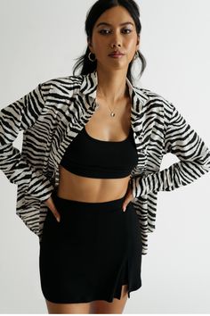 Extra Attention Black & White Zebra Button Down Blouse https://www.tobi.com/product/77997-tobi-extra-attention-zebra-button-down-blouse?color_id=110930&utm_source=pinterest&utm_medium=social&utm_campaign={campaignid}_{adgroupid}_{product_id} Zebra Button Up Outfit, Chic Zebra Print Blouse, Casual Long Sleeve Tiger Print Tops, Black Long Sleeve Top With Tiger Print, Black Tiger Print Long Sleeve Tops, Trendy Long Sleeve Tiger Print Tops, Trendy Black Zebra Print Tops, Black Long Sleeve Tiger Print Tops, Casual Long Sleeve Zebra Print Tops