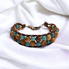 Turquoise & Picasso Jasper Maui Wrap Bracelet Comes with an adjustable clasp &  magnetic closure for ease of taking on and off.   ⭐️ Sold Individually. Price is per individual bracelet.  📏 Bracelet pictured is size 7  (medium size), but can be made to order by request. Handmade Adjustable Turquoise Leather Bracelet, Adjustable Turquoise Wrap Bracelet, Adjustable Turquoise Leather Bohemian Bracelet, Adjustable Turquoise Beaded Bracelets With Natural Stones, Adjustable Beaded Turquoise Leather Bracelet, Adjustable Turquoise Beaded Leather Bracelet, Adjustable Hand Wrapped Turquoise Bracelets, Adjustable Turquoise Hand Wrapped Jewelry, Artisan Turquoise Beaded Bracelets Adjustable