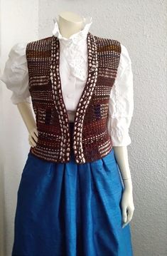 70s crochet woven vest, retro knitted vest, brown multicolor woven vest, no buttons bohemian vest, spring preppy vest, unique vest, color block chunky vest, handmade vest. The vest is in good vintage condition but is not dry clean. Measurements laying flat : shoulders :39 cm (15,5 inches) armpit to armpit: 43 cm (17inches) total lenght:48cm (19 inches) Fitted Retro Brown Sweater Vest, Retro Fitted Brown Sweater Vest, Multicolor Bohemian Sleeveless Sweater Vest, Brown Knitted Sleeveless Vest, Fall Crochet Sleeveless Sweater Vest, Crochet Sleeveless Sweater Vest For Fall, Vintage Crochet Sleeveless Vest, Fitted Brown Bohemian Vest, Chunky Vest