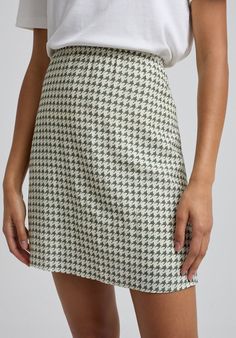 This season's latest iteration to our Sadie skirt is in our new Houndstooth print and cut from crepe. Fully lined, with an elasticated waist, it brings style, comfort, and versatility. Pair with flats and a cream jumper for daytime chic and switch for heels, a camisole and jacket to take you through the night. The perfect addition to your autumn wardrobe.  Cool machine wash only. Wash inside out and with similar colours 100% viscose Sourced in India  Cool machine wash only. Wash inside out and w Elegant Houndstooth Mini Skirt, Spring Workwear Skirt With Houndstooth Pattern, White Mini Skirt With Houndstooth Pattern, Houndstooth Mini Skirt For Spring, White Houndstooth Skirt For Fall, Spring Houndstooth Mini Skirt, Spring Mini Skirt With Houndstooth Pattern, Houndstooth Mini Skirt, Cream Jumper