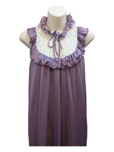 This is a lovely vintage floor length nightgown from the late 70's-early 80's. It is a lavender purple nylon with a lace bib and frill details around the neck and bust. Super cute! MATERIAL: Synthetic/Nylon MEASUREMENTS (taken flat) 18" bust 22" waist 51" length CONDITION Good vintage condition showing some signs of wear. There are some small spots showing signs of thinning/wear in the fabric as well as a few small spots where there is some discoloration that I have not attempted to clean. There are some spots on the frills where the piping at the edge is missing and the bottom hem is starting to come undone. I have attempted to highlight these flaws in my photos. None of these flaws are distracting or compromise the integrity of the gown. It is ready to be worn for years to come! Purple Lace Sleepwear With Lace Trim, Vintage Sleeveless Ruffled Sleepwear, Sleeveless Lace Patchwork Nightgown For Sleep, Purple Sleeveless Sleepwear, Purple Sleeveless Nightgown For Bedtime, Purple Sleeveless Bedtime Dress, Purple Sleeveless Dress For Bedtime, Purple Sleeveless Sleepwear For Sleepover, Sleeveless Purple Dress For Sleepover