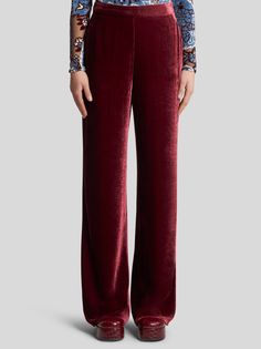 Straight-cut, wide-leg palazzo trousers in silk-blend velvet.• Loose fit • Elasticated waist• Side pockets• Made in Italy• The model is 5’10” (178 cm) tall and wears a size 40 (IT) • 80% viscose, 20% silk Velvet Palazzo, Poncho Jacket, Palazzo Trousers, School Events, Suit Shirts, Fragrance Collection, Lacing Sneakers, Explore The World, Espadrille Shoes