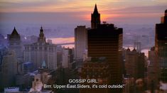 the sun is setting over a city with tall buildings and skyscrapers in the foreground