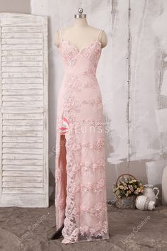 A subtly embellished bodice features an scalloped V neckline, beaded crosshatch embroidery, and delicate lace that cascade into a slit skirt. Baby pink color and sophisticated low back with spaghetti straps make this long evening dress an vintage style. Light Pink Dress Prom, Crosshatch Embroidery, Prom 23, Pink Evening Gowns, Boho Bridal Dress, Dream Prom Dress, Gown Ideas, Baby Pink Dresses, Pink Long Dress