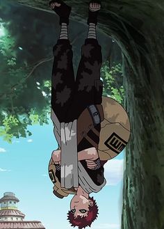 a man hanging upside down in the air