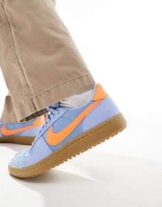 Sneakers by Nike A pop of color Low-profile Lace-up fastening Padded tongue and cuff Signature Nike branding Gum sole Textured grip tread Orange Trends, Nike Air Max Jordan, Nike A, Nike Branding, Purple And Orange, Spring Floral Dress, Leggings Sale, Orange Fashion, Jumpsuit Shorts Rompers