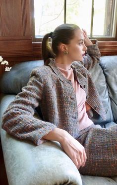 "Custom-made suit of the most exquisite Irish wool tweed. Outstanding in every way, the suit is classic high chic.  The cut of the jacket is boxy and short. The skirt is narrow, fitted and just-below-knee length. The fabric is a rich imported wool tweed woven in boxy squares of gray, pink, lavender and taupe.  Couture features: Jacket Full lining of dusky peach crepe. Interior and lining are hand finished  It features three rows of top-stitching around the edge of the rounded collar and down eac 1960s Couture, Couture Suit, Peach Crepes, Irish Tweed, Skirt Hangers, Preppy Vintage, Corporate Fashion, Pink Lavender, Tweed Skirt