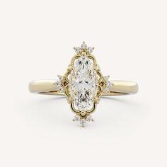 a yellow gold ring with an oval cut diamond in the center and small round diamonds on each side