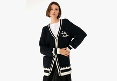 a cozy one a fancy one an embellished one an oversized one...the answer is no. you can't ever have too many sweaters. | Kate Spade Oversized Logo Cardigan, Black/cream - XL Kate Spade Outlet, Cardigan Black, Black Cream, Sweaters & Cardigans, Cardigans, Outlet, Kate Spade, Cream, ? Logo