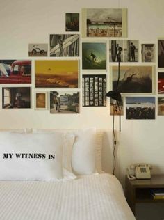 a bed with white sheets and pictures on the wall above it that says, my witnesses is