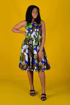 This beautiful dress is a perfect slay for you to rock. You won't go unnoticed on this outfit. Can be worn to party, beach, bachelor's eve... This dress is made with 100% African wax cotton. Made with love in Nigeria zipper at the back Fully lined Measurements needed: Bust: round d upper part of the bust Shoulder: from shoulder bone to shoulder bone Under bust: Waist: round d slimmest part of the waist Length: your preferred length from highest part of the shoulder Custom measurements are welcom Fitted Sleeveless Sundress With Vibrant Print, Casual Sleeveless Bold Print Dress, Spring Sleeveless Dress With Bold Print, Sleeveless Cotton Dress With Batik Print, Sleeveless Dresses With Vibrant Print, Sleeveless Printed Dress For Casual Wear, Casual Sleeveless Dress With Batik Print, Casual Printed Sleeveless Dress, Casual Sleeveless Midi Dress With Vibrant Print