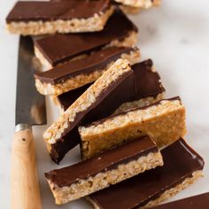 chocolate and graham crackers are arranged on a cutting board