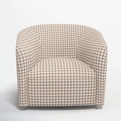 a brown and white checkered chair on a white background