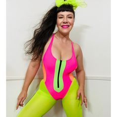 Late 1980s vintage neon color block one piece swimsuit by La Blanca. Stretchy spandex with a nylon lining at the front. Neon pink with neon orange at the sides. Neon green front panel with a black plastic zipper. Criss cross tank straps. Scoop back. Very high cut legs. Medium coverage bottoms. Pulls up onto the body. { LABEL- FABRIC- TAG SIZE } La Blanca Spandex No size tags { MEASUREMENTS } Shown on a 5'8" Mannequin with 33" Bust- 25" Waist- 35" Hips  DOES STRETCH Bust- 32-36" Waist- 24-32" Hips- 36-38" Leg Openings- 26-32" Total Length- 29-33" { CONDITION } Excellent Condition PLEASE READ BEFORE PURCHASING For best fit, please compare measurements to a garment of your own that fits comfortably and please measure yourself before completing your purchase. It is normal for humans measuremen Pink Fitted Fun Bodysuit, Retro Color Block Swimwear For Swimming, Pink Fitted Rave Swimwear, Fitted Pink Rave Swimwear, Playful Pink Stretch Bodysuit, Retro Color Block Swimwear, Pink Retro Stretch Swimwear, Pink Nylon Sports Bodysuit, Pink Nylon Bodysuit For Sports