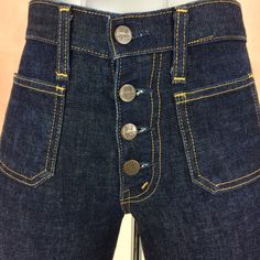 "Size 28 Vintage Western Sailor Bootcut Jeans W28 L32 Mid Waist Exposed Button Fly Wide Leg Flare Jeans, waist 28\" medium Brand: Big John Fits like 28\" waist, 10.5\" rise, 21.5\" thighs, 36\" hips, 32\" inseam, 21.5\" leg opening! Fits a size 28, but check your measurements and compares the measurement with your garment. (see full measurement below) Recommended waist size: 28\" (28x32) Material :  ✂ Cotton 100% ✂ Exposed Button Fly ✂ Scovill rivets ✂ Made In JAPAN Dark Wash Big John Western Sa Mid-rise Fitted Pants With Button Closure, Fitted Mid-rise Bottoms With Button Closure, Fitted Wide Leg Jeans With Button Closure, Classic High Rise Pants With Button Closure, High Waist Fitted Jeans With Button Closure, Mid-rise Bottoms With Snap Buttons For Fall, Fitted High Waist Jeans With Button Closure, Classic Fitted Bottoms With Button Closure, Classic Fitted Jeans With Snap Buttons