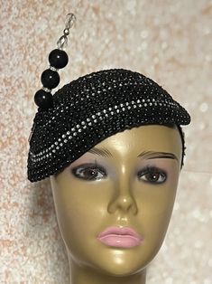 Simple, yet elegant. Black Beaded Fascinator half hat trimmed with rhinestones, and hat pin. The hat pin is for decorative purposes only. The hat is affixed to the head via a hatstring. The hat measures approximately 9.75 in X 6.75 inches at its widest parts. PLEASE NOTE All items for Free Shipping will be shipped via USPS First Class Mail. Gifts for mom, sister, wife, or yourself. Gatsby Style Evening Fascinator With Short Brim, Embellished Adjustable Headpieces For Evening, Evening Gatsby Style Fascinator With Short Brim, Gatsby Style Mini Hat With Short Brim For Evening, Elegant Hats For Vintage Events, Elegant Adjustable Mini Hats For Vintage Events, Elegant Embellished Hats For Formal Occasions, Evening Gatsby Mini Hat With Short Brim, Elegant Mini Hats With Rhinestones For Weddings