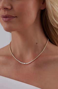 A graduating row of bezel-set diamonds illuminates your neckline with eternal shine on this brilliant necklace forged from 18-karat gold. 16" length; 1" removable extender Tongue-and-groove closures Total diamond weight: 4.47ct. Color: G–H Clarity: VS–SI 18k gold/diamond Imported >Diamond Guide Diamond Guide, Bezel Set Diamond, Tennis Necklace, Tongue And Groove, Shine On, Clean Girl, G H, Bezel Setting, Bling Bling