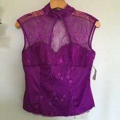 Do & Be Lace Sleeveless Top Size M Magenta New With Tags Bundles On Multiple Items Are Welcome, As Well As Offers! Thank You For Visiting My Closet Please Let Me Know If You Have Any Questions Purple Fitted Lace Top, Fitted Purple Lace Top, Stretch Purple Sleeveless Tank Top, Purple Stretch Sleeveless Tank Top, Purple Camisole Tank Top For Party, Purple Fitted Sleeveless Tank Top, Fitted Purple Sleeveless Tank Top, Fitted Sleeveless Purple Tank Top, Fitted Halter Neck Lace Top