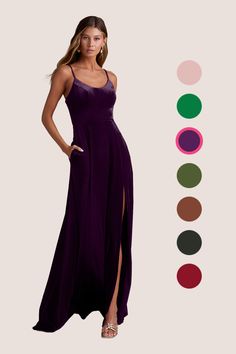 a woman in a long purple dress with different colors