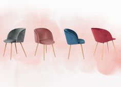 three different colored chairs sitting next to each other on top of a pink and white background