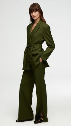 A versatile jacket, our boxy Belted Blazer can be worn belted and cinched at the waist or left open for a more casual look. While the fit is designed to be oversized, the blazer still strikes a sculpture silhouette with powerful shoulders and smart cuff sleeves. Additional details include a wool felt combo beneath the collar, a wide lapel, and interior pockets. Olive Green Suit For Women, Womens Green Suit, Green Womens Suit, Green Suit Women, Olive Blazer, Olive Green Suit, Oversized Blazers, Olive Style, Christmas Attire